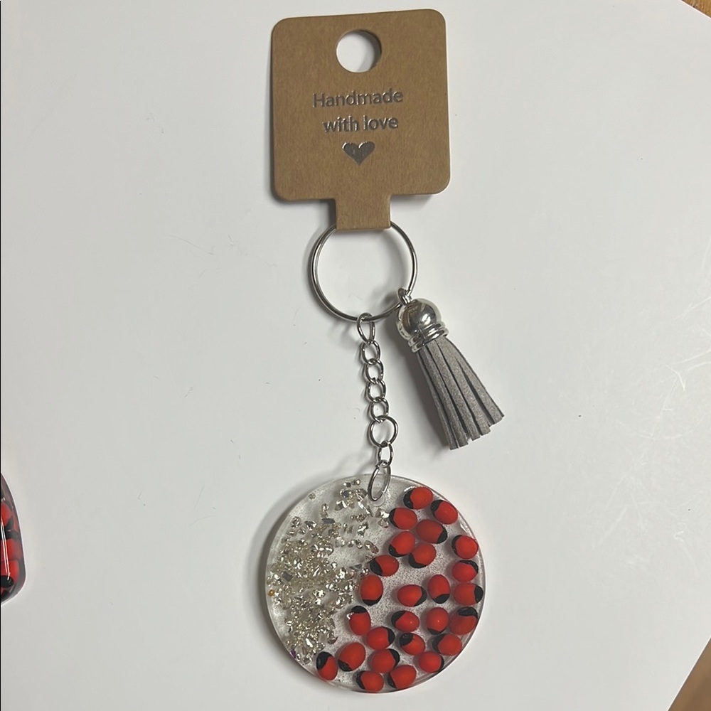 Huayruros Handmade keychains. Chakra, Luck, Protection and Prosperity